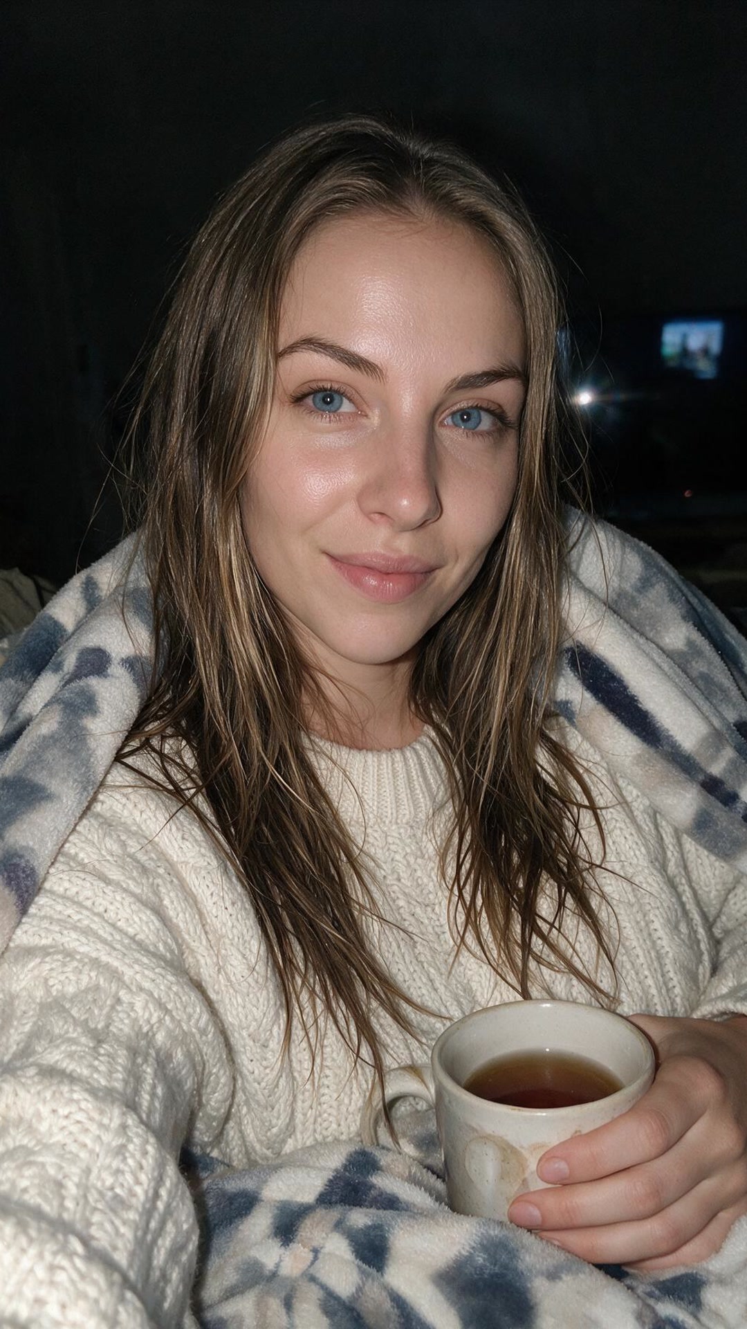 Amina — Tea, a blanket, and a show I've already seen twice.